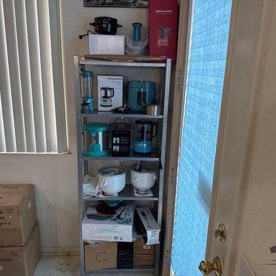 #11022 • Storage Rack with Kitchen Equipment
