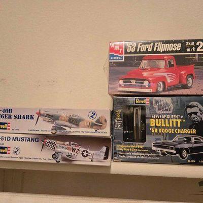 #12522 • Collection of Four Unassembled Model Kits
