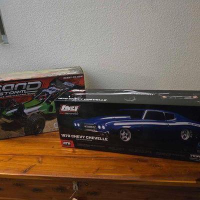 #12060 • Losi 1970 Chevy Chevelle and Sand Storm RC Cars
