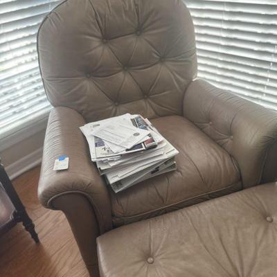 Leather chair is nice and comfortable.  Some wear