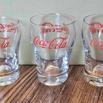 Several Coca Cola items