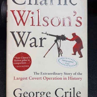 George crile signed charlie wilson’s war”