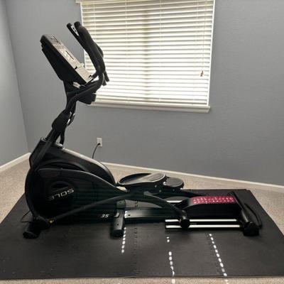 Lot #32 - Sole E35 Elliptical Machine with Adjustable Features and Mat