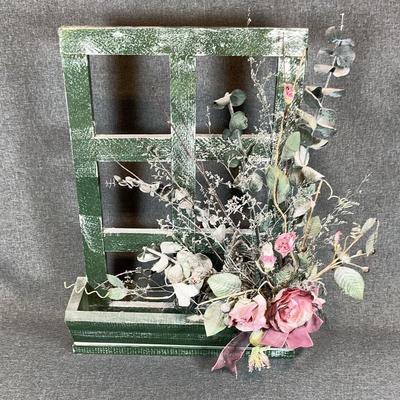 Silk Flower Arrangement In Window Setting 