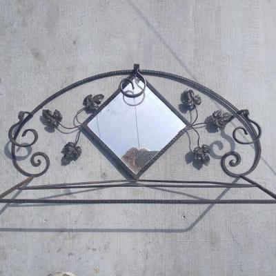 Antique wrought iron wall wrack