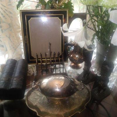 Various silverplate items bronze griffin candlestics antique frames