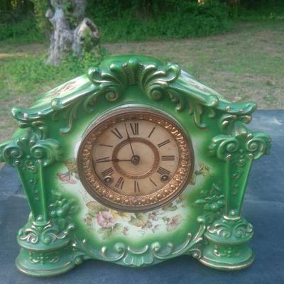 Large porcalian mantle clock