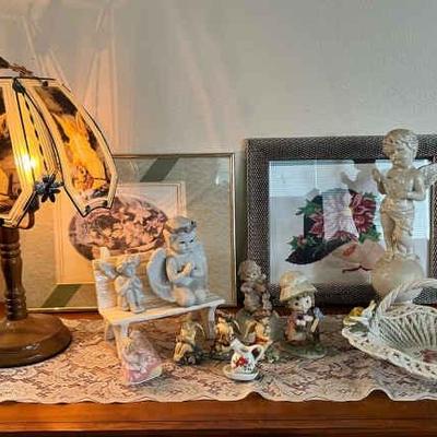 https://ctbids.com/estate-sale/34797/item/3906545/Vintage-Tiffany-Style-Cupid-Lamp-Cherub-Decor