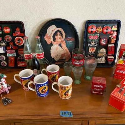 https://ctbids.com/estate-sale/34797/item/3908946/Coca-Cola-Collection