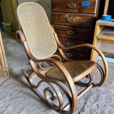 https://ctbids.com/estate-sale/34797/item/3906495/Rattan-Back-Curved-Wood-Rocking-Chair