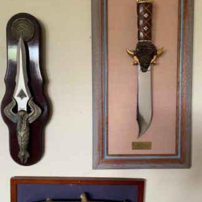 https://ctbids.com/estate-sale/34797/item/3902176/Wolves-Buffalo-Egyptian-Knives