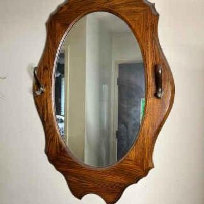 https://ctbids.com/estate-sale/34797/item/3906546/33x29-Solid-Oak-Oval-Mirror