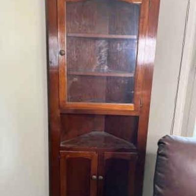 https://ctbids.com/estate-sale/34797/item/3906529/Vintage-Solid-Wood-6-2-X-30-Corner-Curio-Cabinet-With-Glass-Door