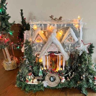 https://ctbids.com/estate-sale/34797/item/3909312/Christmas-Cottage