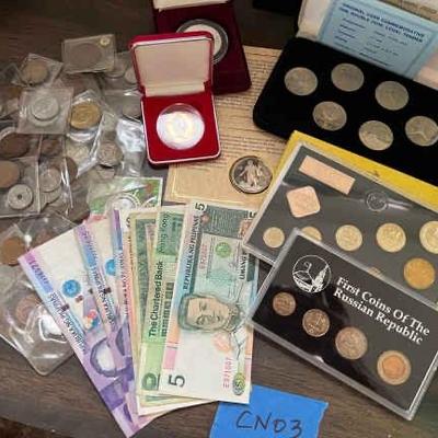 https://ctbids.com/estate-sale/34797/item/3902186/Interantional-Currency-And-Collectable-Coins