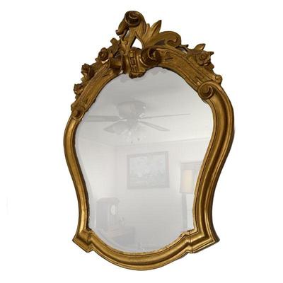 Gilt Carved Mirror | Rococo style gilt mirror with floral and scrollwork decorations. - h. 35.25 x w. 25 in


