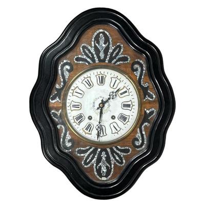 French Mother of Pearl Wall Clock | Circa 19th century, ebonized wood frame, enameled face with Roman numeral markers and signed...