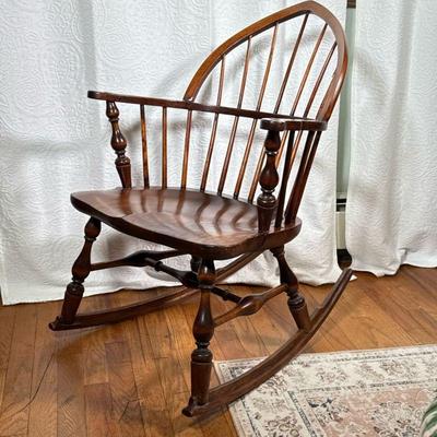 Child's Windsor Rocking Chair | Of small size, having a spindle arched back over a shaped seat. - h. 33 x w. 25 x l. 28 in


