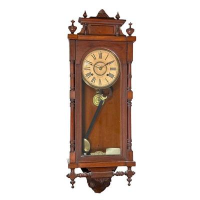 Ansonia Queen Elizabeth Wall Clock | The face with Roman numeral markers, with Ansonia Clock Co. label on verso. - h. 33 x w. 13.5 x d....