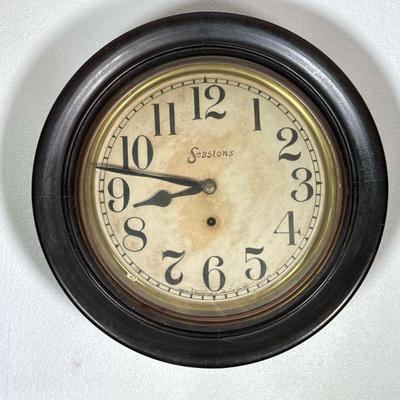Sessions Wall Clock | Sessions Clock Co., hand-painted dial with Arabic numerals in a round black painted wood case. - d. 4 x dia. 17.5 in

