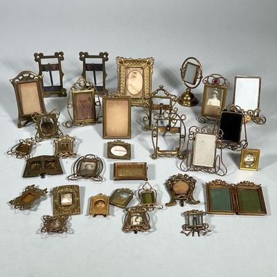 MINIATURE BRASS PICTURE FRAMES | Large lot of miniature brass & copper picture frames.

