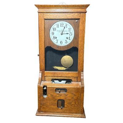 Cincinnati Time Recorder Clock | he Cincinnati Time Recorder Co., Cincinnati Ohio, model F1402, in an oak case. - h. 35.5 x w. 17 x d....