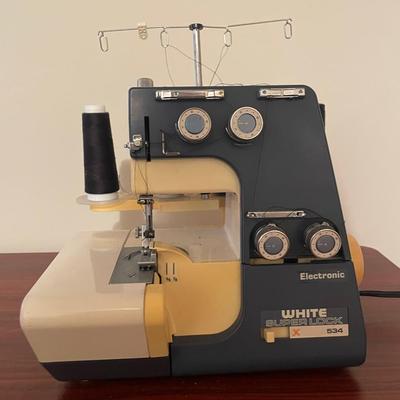 White Super Lock 534 Electronic Serger with Foot Pedal