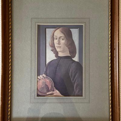 Sandro Botticelli's Portrait of a Young Man Holding a Medallion