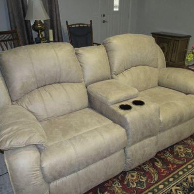 Couch with power recliners and built in console