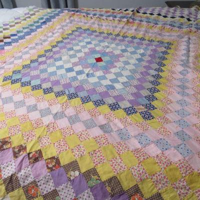 Quilt top made with lots of feed sack material.  This is only a top- not a completed quilt