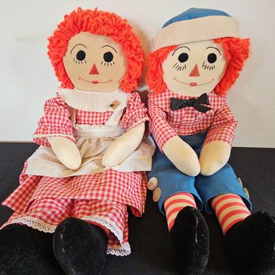 A TIMELESS COUPLE OF RAGGEDY ANN AND ANDY DOLLS