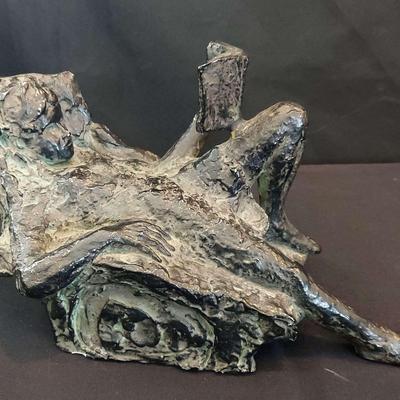 DECORATIVE SCULPTURE OF A GIRL READING