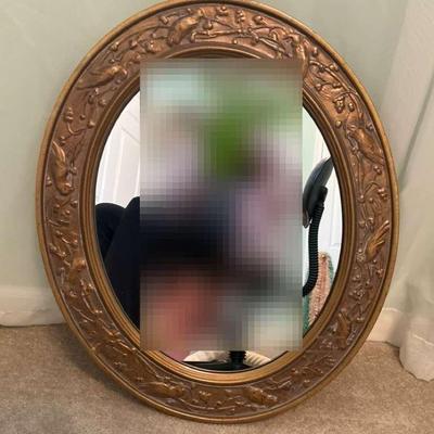 Oval Framed Gold Resin Mirror