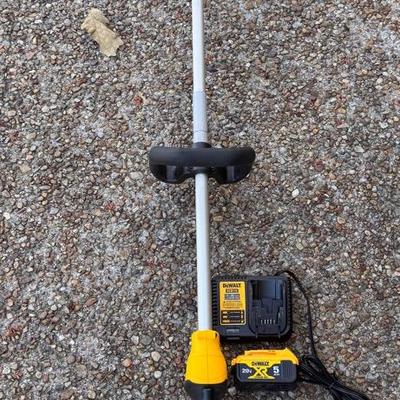 Lot 203: Dewalt String Trimmer. Battery  Operated DCST925