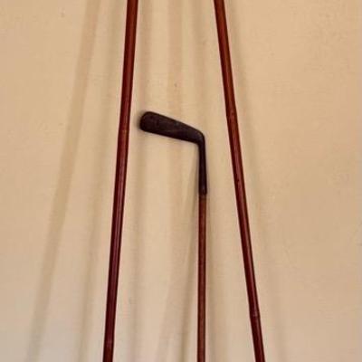 Lot 238: Vintage Bamboo Ski Poles & 1920’s Vintage George Nicoll Whippet Putter