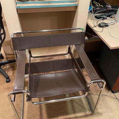Two MCM Chairs (Made in Italy)