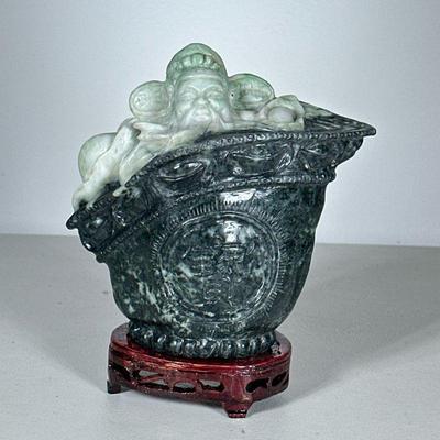 Chinese Carved Serpentine Figure | Scholar in a cup, with a wood stand and fitted box. - h. 6.25 x w. 6.25 in (jade only)

