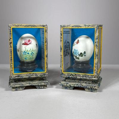 (2pc) Hand Painted Eggs | Eggs on stands in original boxes. Made in China. - h. 5 x w. 3 x d. 3 in