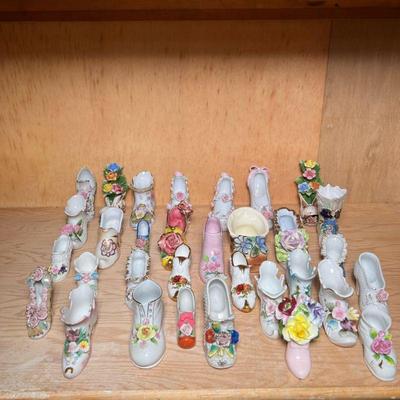 (32pc) FLORAL PORCELAIN SHOES | Mixed lot of flower decorated porcelain & other ceramic shoe, by various makers. - h. 3.75 x w. 2 x...