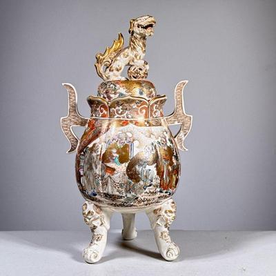 SATSUMA TRIPOD CENSER | Satsuma lidded & footed censer, the lid with a with gilt lion form finial. - h. 14 x dia. 6 in

