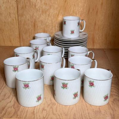 (23pc) Rose Porcelain Tea Set | Rose and gilt decorated china tea or coffee set including 12 handled cups and 11 saucers, with red...
