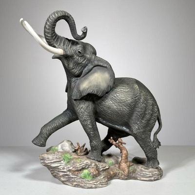 Porcelain Elephant Figure | Issued by the African Wildlife Foundation, for The Franklin Mint, 1989, hand painted fine porcelain. - h. 12...
