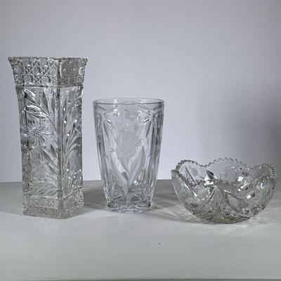 (3pc) Floral Crystal | Decorative cut glassware, including a square vase, a rose patterned cut crystal bowl (dia. 8 in.), and a frosted...