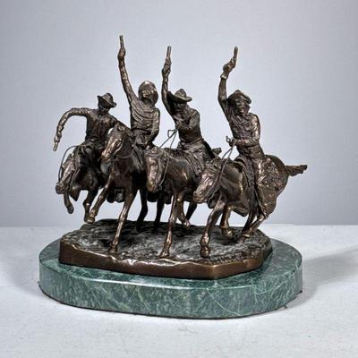 Horses & Cowboys Bronze | After Frederic Remington, showing four cowboys with guns charging. Affixed to a green marble slab. - h. 8 x...