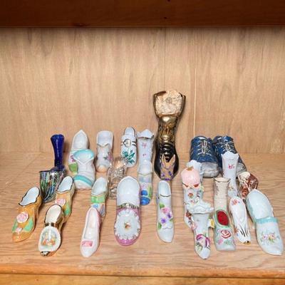 LARGE MIXED LOT SHOE FIGURES | Ceramic, porcelain, glass, wood, and other shoe figures, with some pieces marked, including French,...