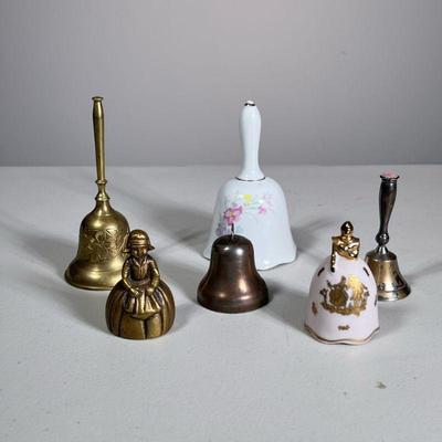 (6pc) MIXED DINNER BELLS | Mixed lot of dinner bells including: ceramic bells, brass bells, silver plate bells, and more. - h. 5 x dia. 3...