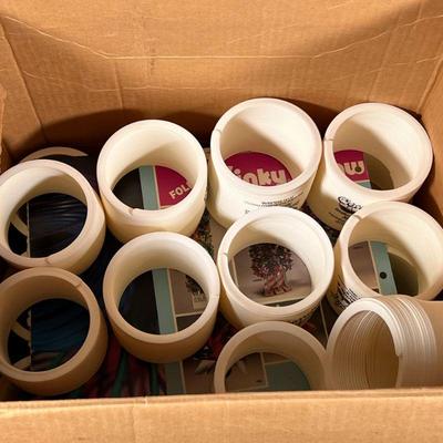 Box of Slinkies | Over 20 promotional plastic slinkies with boxes.