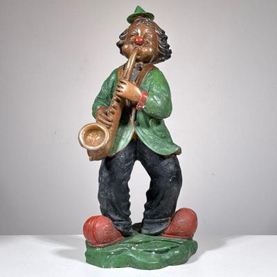 “CONTI” BRONZE CLOWN SCULPTURE, SAXOPHONE PLAYER | Signed “Conti” on the base, red and green painted bronze figure. - h. 19 in