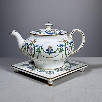 (2pc) Teapot with Trivet | This set with gold trim, fountains and vines is marked Mintons England and numbered. - h. 5.5 x w. 9 in...