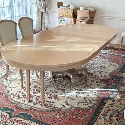 CARVED LIGHT WOOD PEDESTAL DINING TABLE | Extending with three leaves. Each leaf 20 inches. Total extended length 114 inches. - h. 29.5 x...